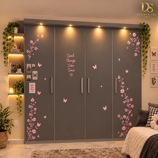 Pink floral and butterfly wall stickers decorating a bedroom wardrobe – Deewar Saz